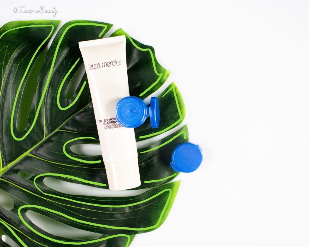 Lotion and Lacons Beauty Sampling Containers on a palm leaf